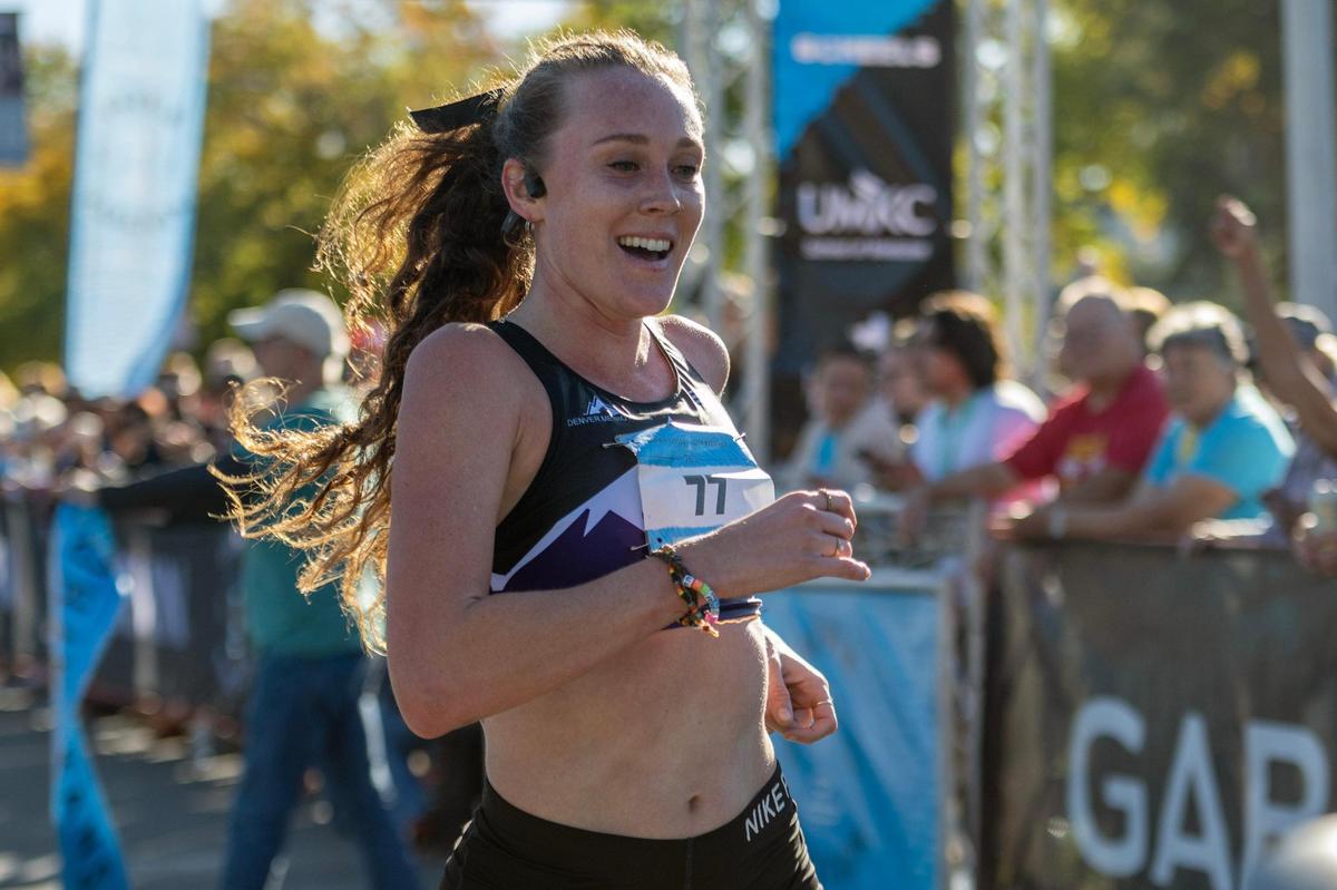 Samantha Farmer was all smiles as she crossed the finish line with the top women’s time in Saturday’s Garmin Kansas City Marathon.