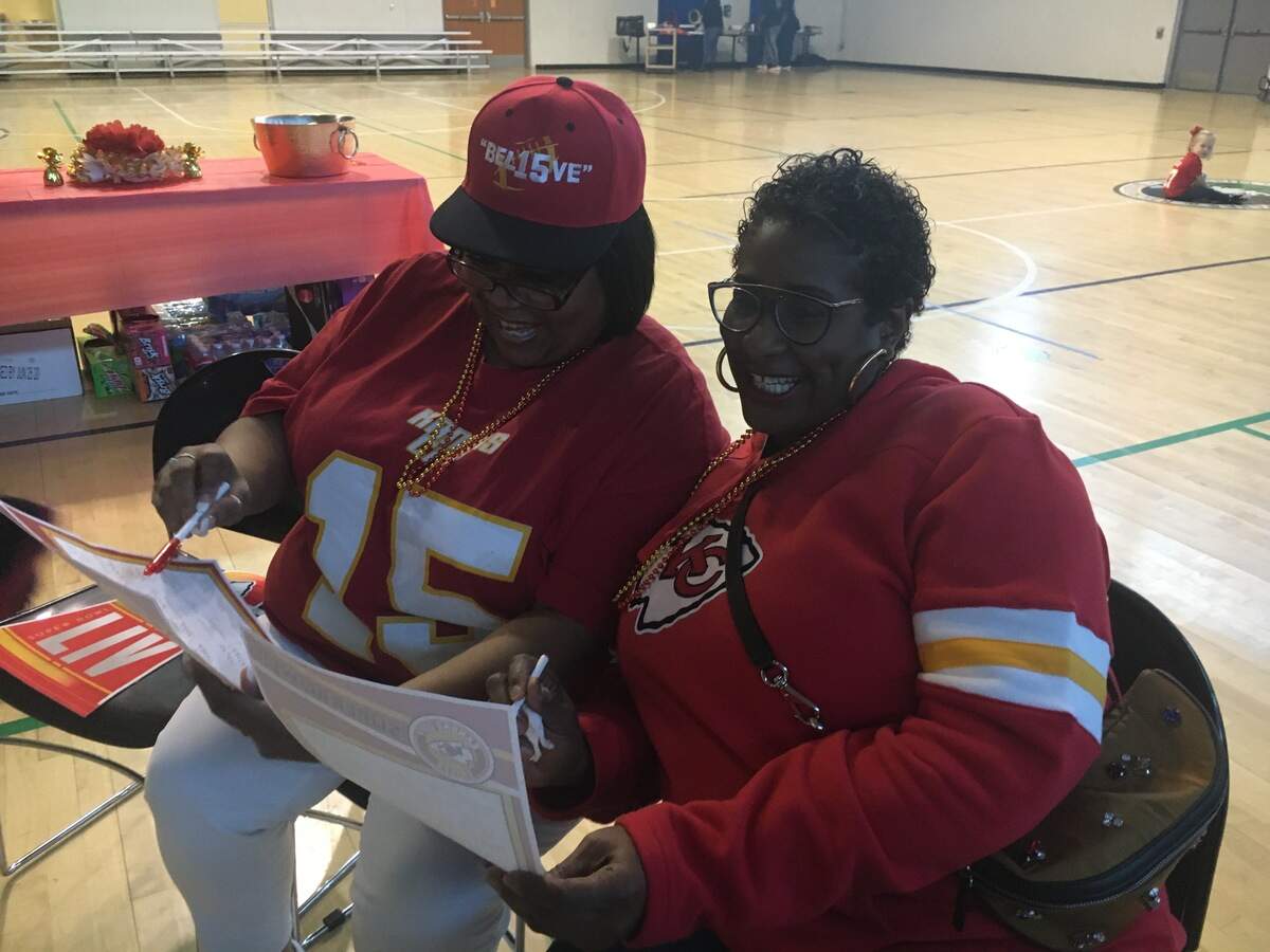 Faye Jacobs, left, with Tracy Bentley at the Southeast Community Center to watch the Kansas City Chiefs take on the San Francisco 49ers in the Super Bowl.