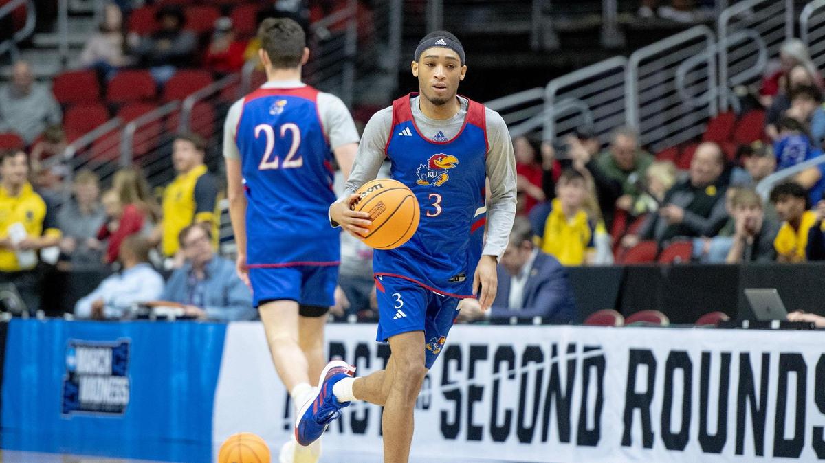 Kansas guard Dajuan Harris Jr. (3) dribbles up the court during shootaround a day ahead of Kansas’ first-round NCAA Tournament game against Howard on March 15, 2023, in Des Moines, Iowa.