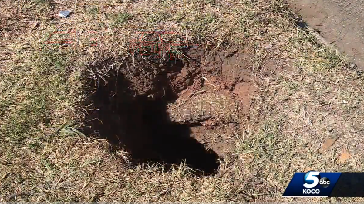 A woman was trapped in this hole overnight. Authorities in Oklahoma believe it was likely a sinkhole, about 8 to 9 feet deep.