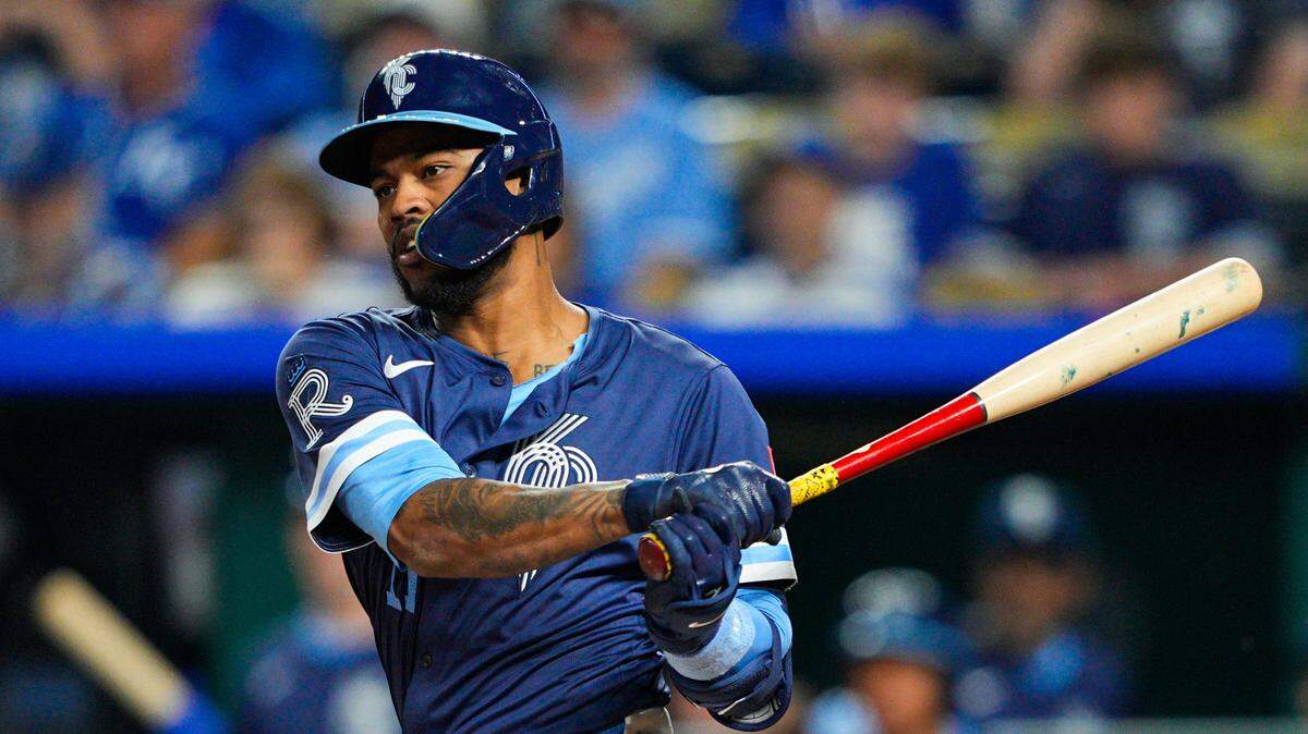 Kansas City Royals third baseman Maikel Garcia (11) hits a triple during the seventh inning against the Detroit Tigers at Kauffman Stadium on May 30, 2025.