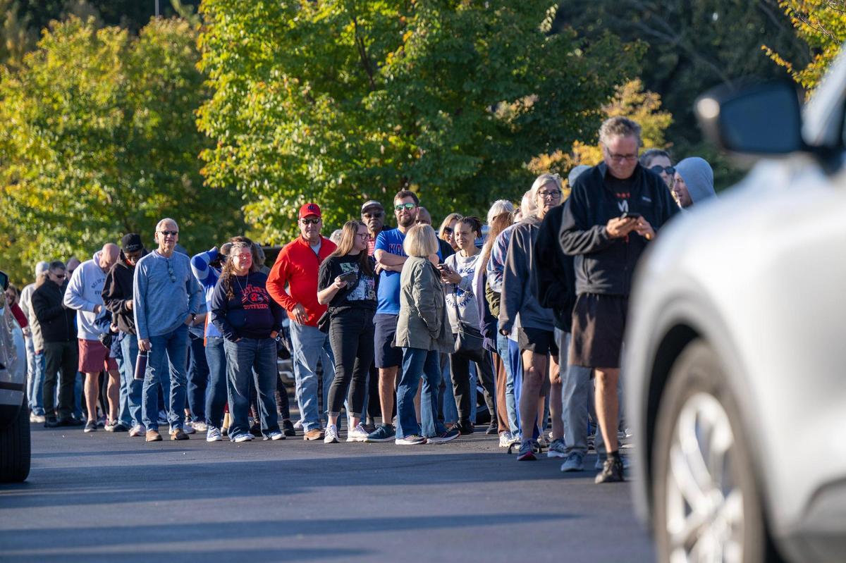 Johnson County residents lined up at The Arts and Heritage Center in Overland Park for the first day of In-Person Advance Voting for the 2024 General Election on Saturday, October 19, 2024.
