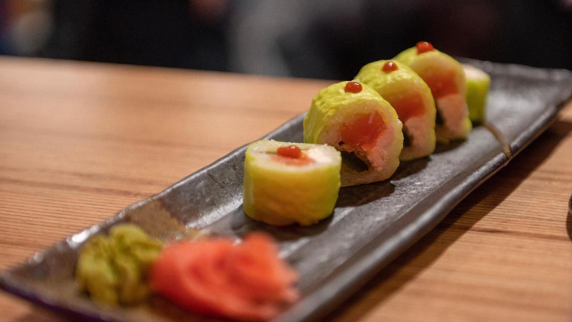 This sushi roll at Blue Sushi Sake Grill includes salmon, cream cheese, jalapeño and shrimp tempura, topped with sriracha sauce.