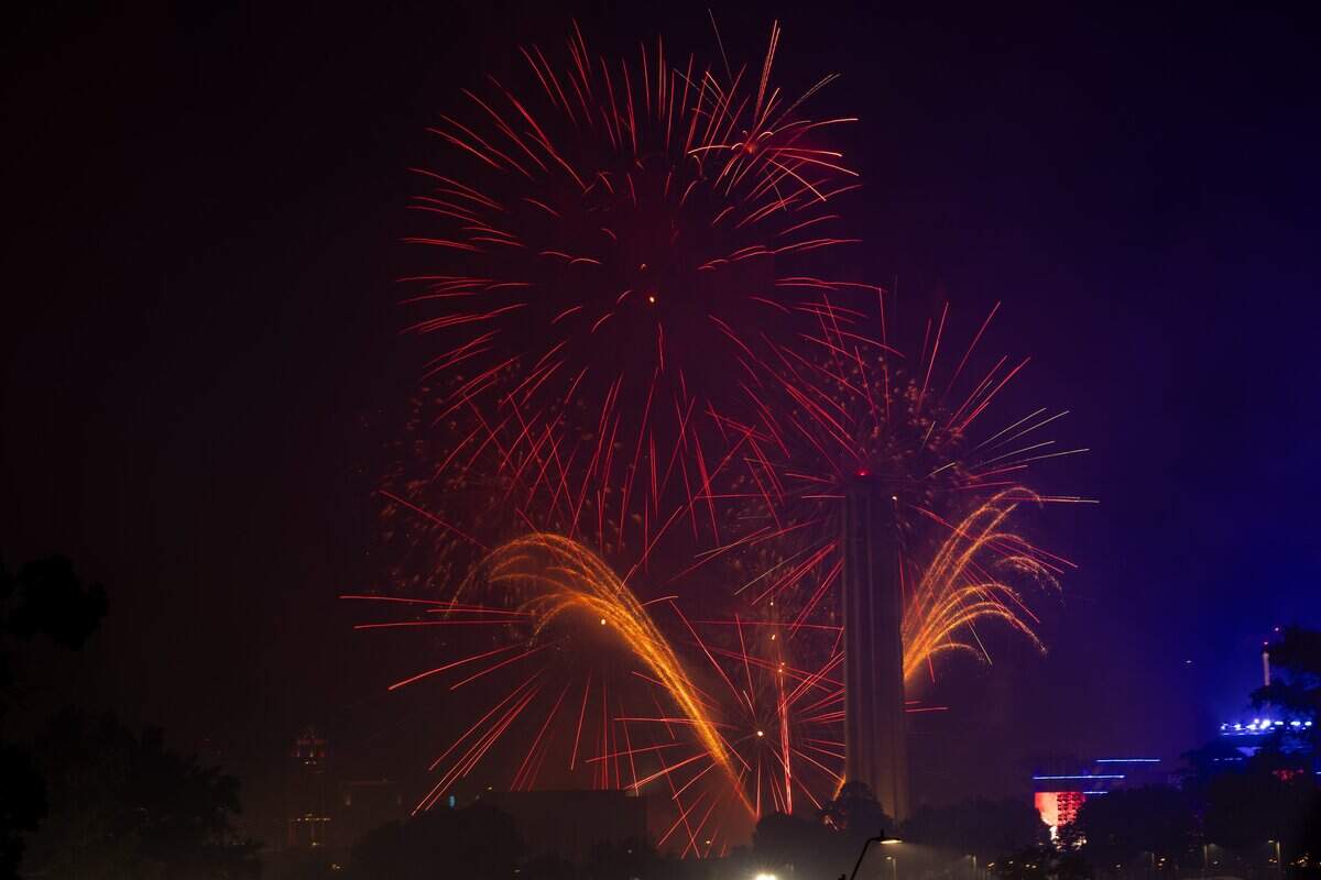 Fireworks light up the night sky over Penn Valley Park on Saturday, July 4, 2026. The National WWI Museum and Memorial's Stars and Stripes Picnic celebrates America's 250th and the Memorial's 100th