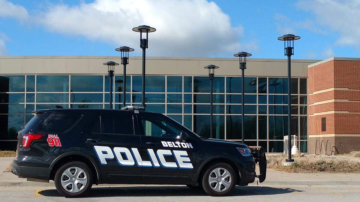 A Belton police officer was hospitalized with broken jaw and eye socket after he was struck by an arrestee at the city jail, authorities said.