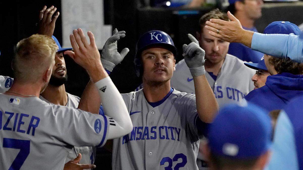 Kansas City Royals’ Nick Pratto is congratulated in the dugout after his home run off Chicago White Sox starting pitcher Lucas Giolito during the second inning of a baseball game Tuesday, Aug. 30, 2022, in Chicago. (AP Photo/Charles Rex Arbogast)