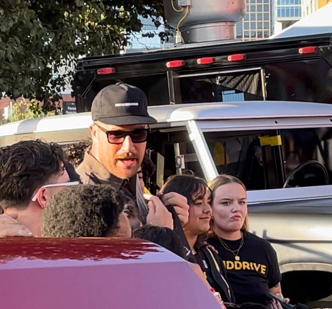 Travis Kelce posed for photos and talked with students from Operation Breakthrough’s Ignition Lab.