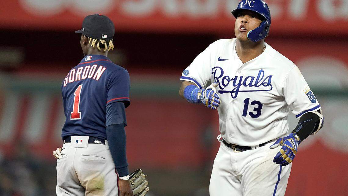 Kansas City Royals’ Salvador Perez (13) celebrates on second after hitting an RBI double during the seventh inning of a baseball game against the Minnesota Twins Tuesday, Sept. 20, 2022, in Kansas City, Mo. (AP Photo/Charlie Riedel)