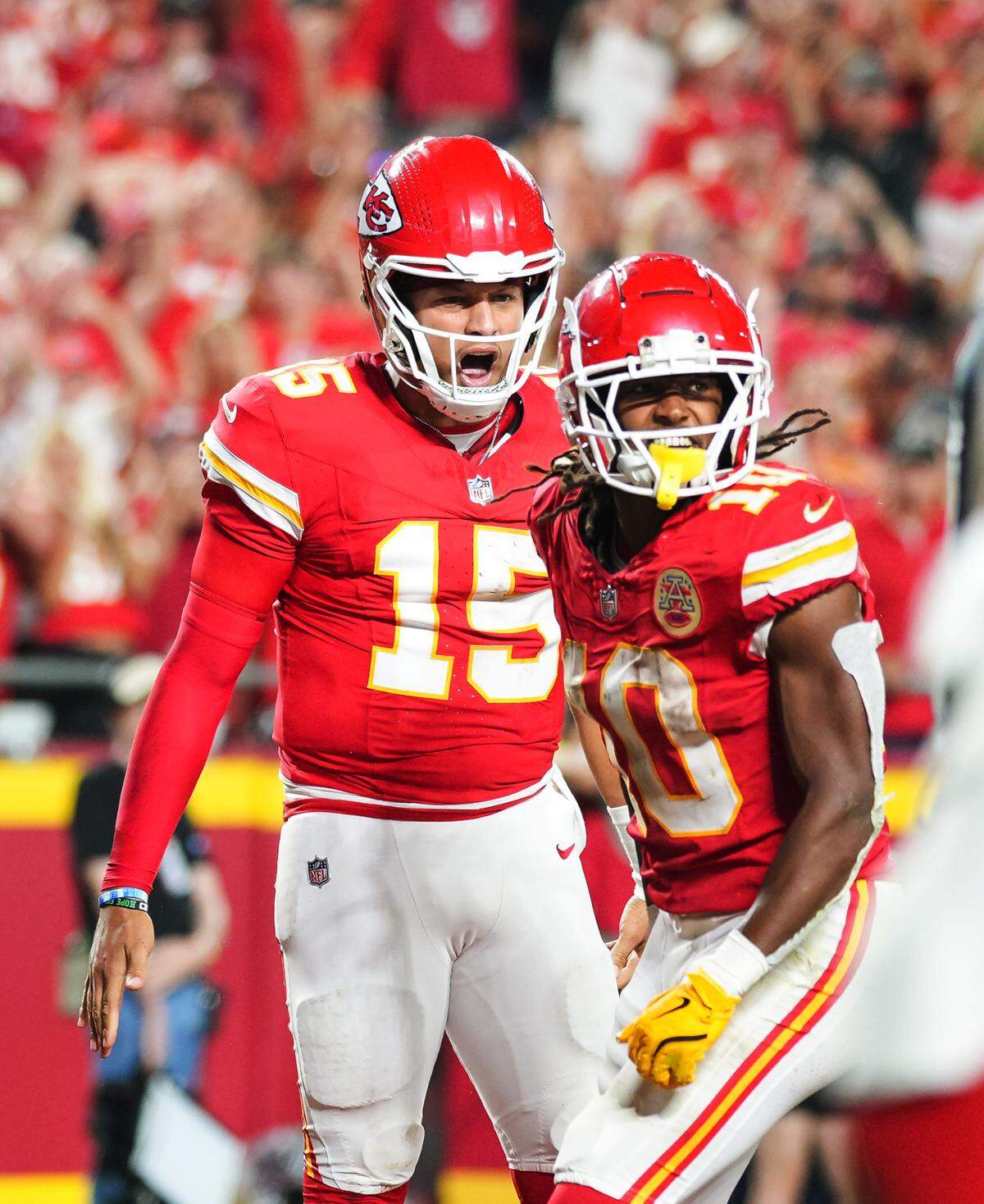 Kansas City Chiefs quarterback Patrick Mahomes, left, and running back Isiah Pacheco celebrate a second-half touchdown during Thursday night’s season opener against the Baltimore Ravens at GEHA Field at Arrowhead Stadium.