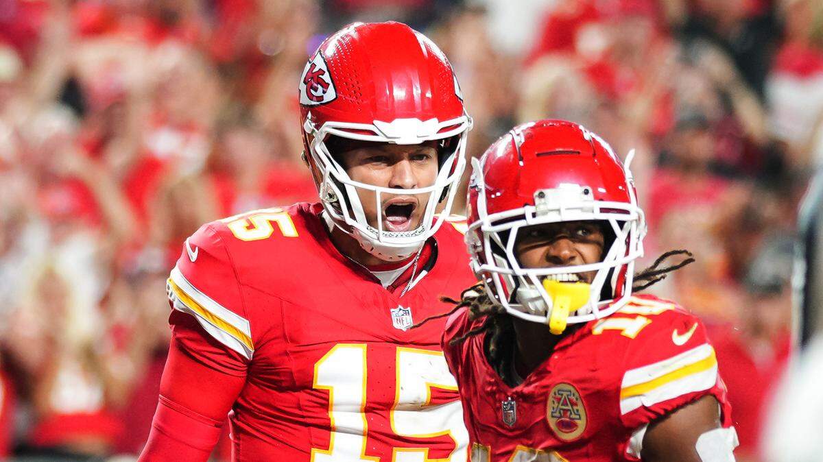 Kansas City Chiefs quarterback Patrick Mahomes, left, and running back Isiah Pacheco celebrate a second-half touchdown during Thursday night’s season opener against the Baltimore Ravens at GEHA Field at Arrowhead Stadium.
