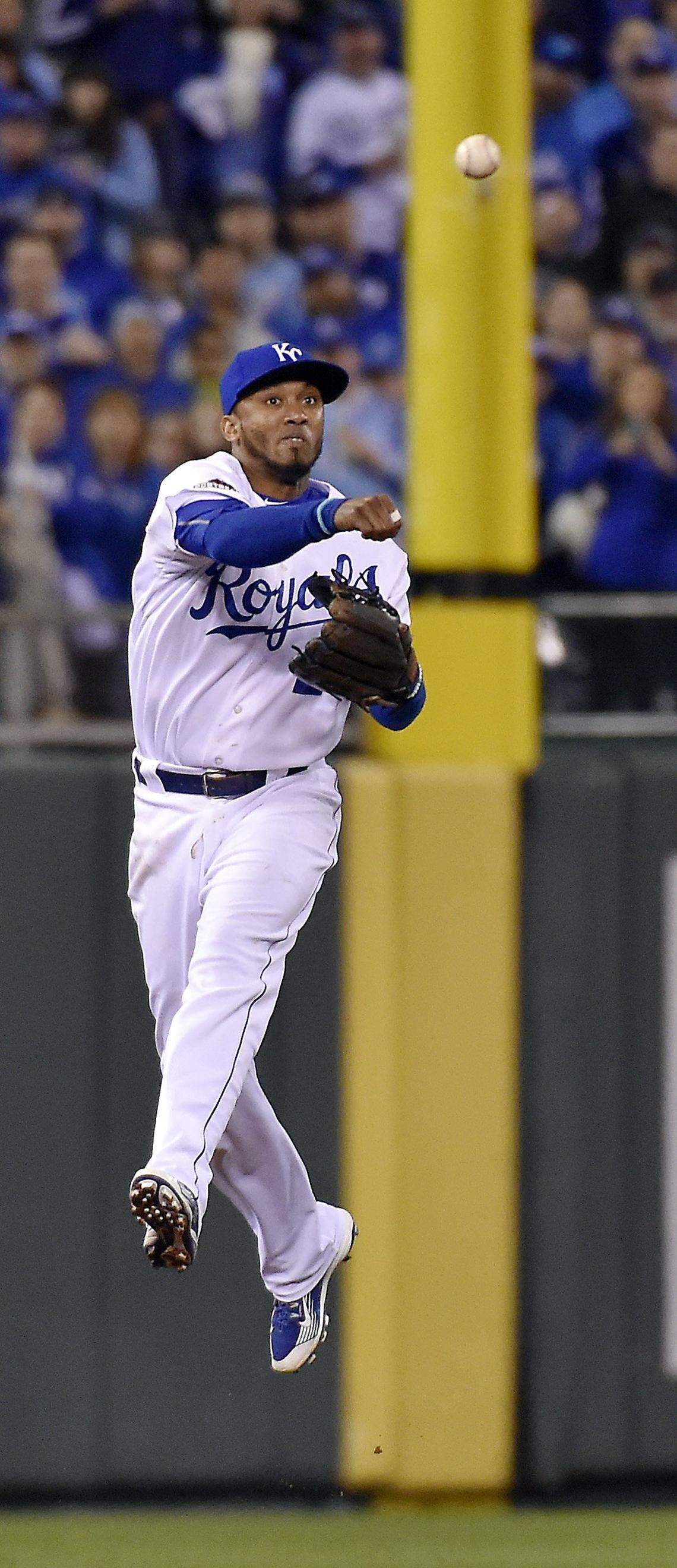 Kansas City Royals shortstop Alcides Escobar field a ball hit by Toronto Blue Jays center fielder Kevin Pillar in the ninth inning during Friday’s ALCS baseball game on October 16, 2015 at Kauffman Stadium in Kansas City, Mo.