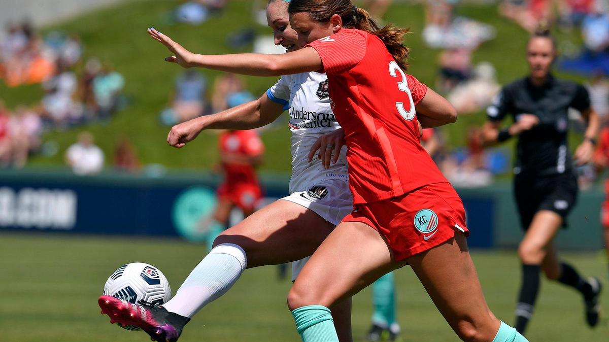 Houston’s Megan Oyster, rear, heads toward the gaol while being pursued by an unlisted player from KC NWSL during the second period of Sunday’s game at Legends Field in Kansas City, Kansas. Houston won, 1-0.