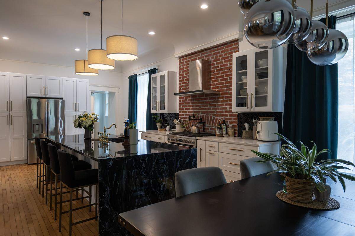 The kitchen and dining area await new homeowners inside the historic Valentine Castle on July 25 in Kansas City.