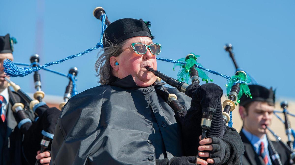 A member from St. Andrews Pipes and Drums plays the bagpipe during the Kansas City St. Patrick’s Day parade on Friday, March 17, 2023, in Kansas City.