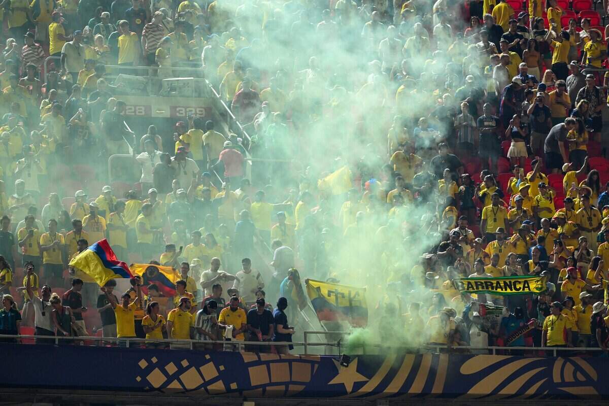 Colombian fans set off smoke flares in the stands following their team’s 1-0 victory over Ghana in the 2026 World Cup Round of 32 football match at Kansas City (Arrowhead) Stadium in Kansas City on Friday, July 3, 2026.