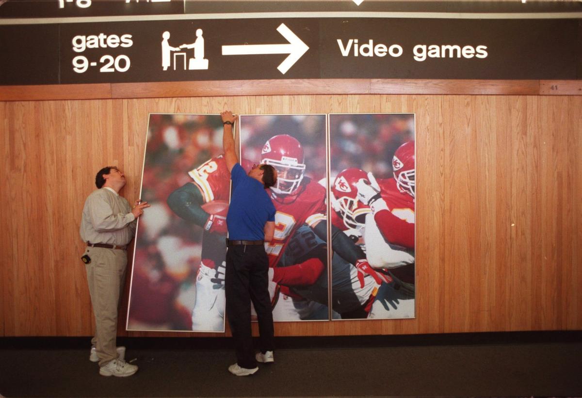 A photo of Kansas City Chiefs great Marcus Allen was placed on the wall of one of the KCI terminals in 1997.