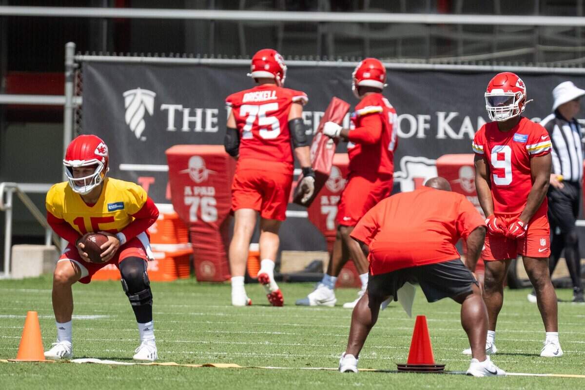 Kansas City Chiefs quarterback Patrick Mahomes and running back Kenneth Walker participate in a drill during Chiefs Minicamp on Tuesday, June 9, 2026, in Kansas City.
