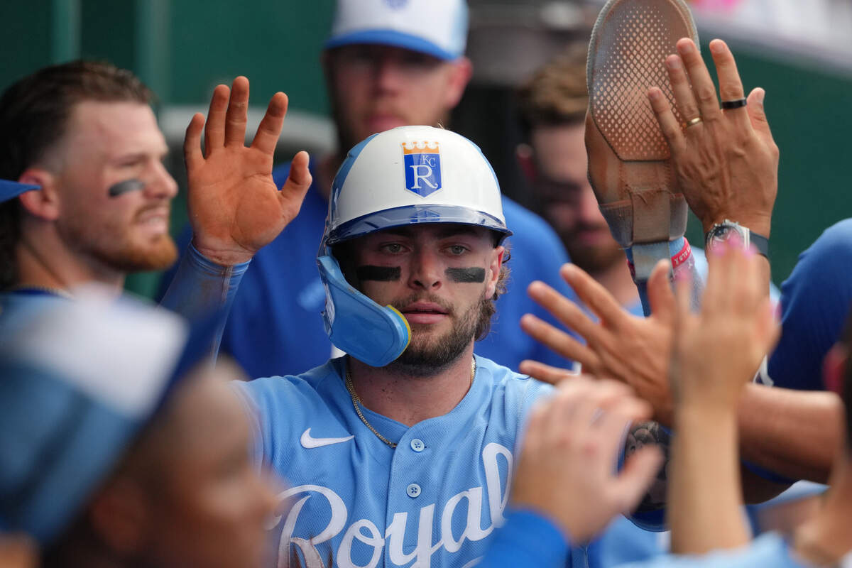 KANSAS CITY, MISSOURI - JULY 18: Carter Jensen #22 of the Kansas City Royals celebrates after scoring in the third inning against the San Diego Padres at Kauffman Stadium on July 18, 2026 in Kansas City, Missouri. (Photo by Ed Zurga/Getty Images)