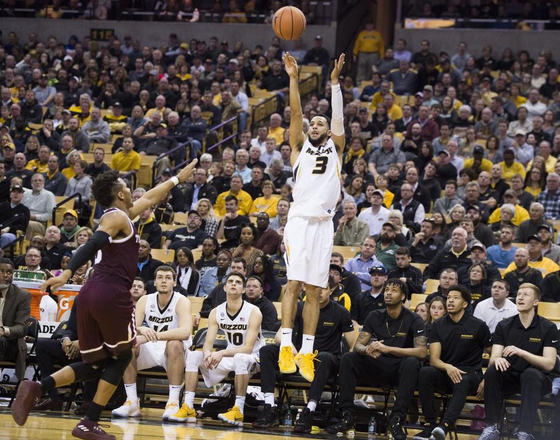 Missouri Tigers guard Kassius Robertson (3) fired a three-pointer as Texas A&M Aggies guard Admon Gilder (3) pursued in the second half during the University of Missouri and Texas A&M University Southeastern Conference basketball game at Mizzou Arena on Tuesday, February 13, 2018, in Columbia, Missouri. Missouri beat A&M 62-58.