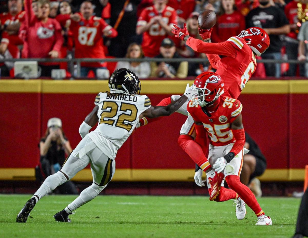 Kansas City Chiefs safety Bryan Cook (6) picks off a pass intended for New Orleans Saints wide receiver Rashid Shaheed (22) in the first quarter on Monday, Oct. 7, 2024, at GEHA Field at Arrowhead Stadium.