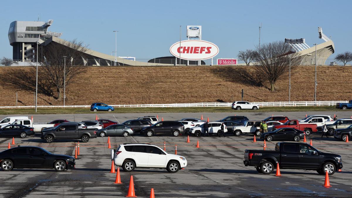 Dozens of Medical personnel, who were stationed across a parking lot near Arrowhead Stadium, began administering the Johnson & Johnson COVID-19 vaccination Friday morning. About 4,000 doses of the vaccine will be given per day both Friday and Saturday at the site.