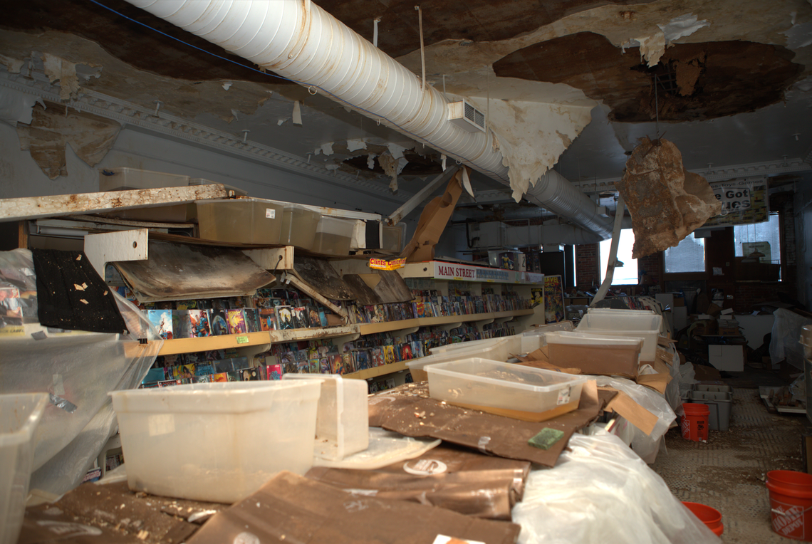 Ceiling damage seen inside the former home of Clint’s Comics in Westport. The city has declared the building to be dangerous.