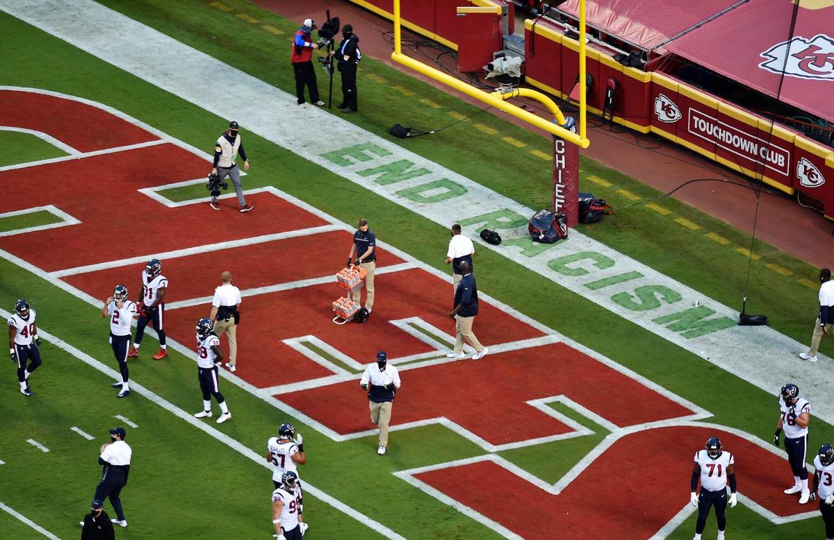 Messages of social justice were painted in the end zones for the Kansas City Chiefs’ season opener against the Houston Texans at Arrowhead Stadium Thursday, Sept. 10, 2020. One end zone had the message “It takes all of us” while the other end zone had “End racism”.