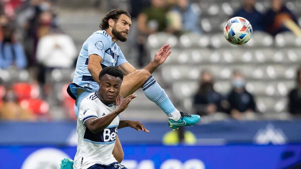 Sporting Kansas City veteran wingback Graham Zusi went airborne during an October Major League Soccer match in Vancouver, Canada.