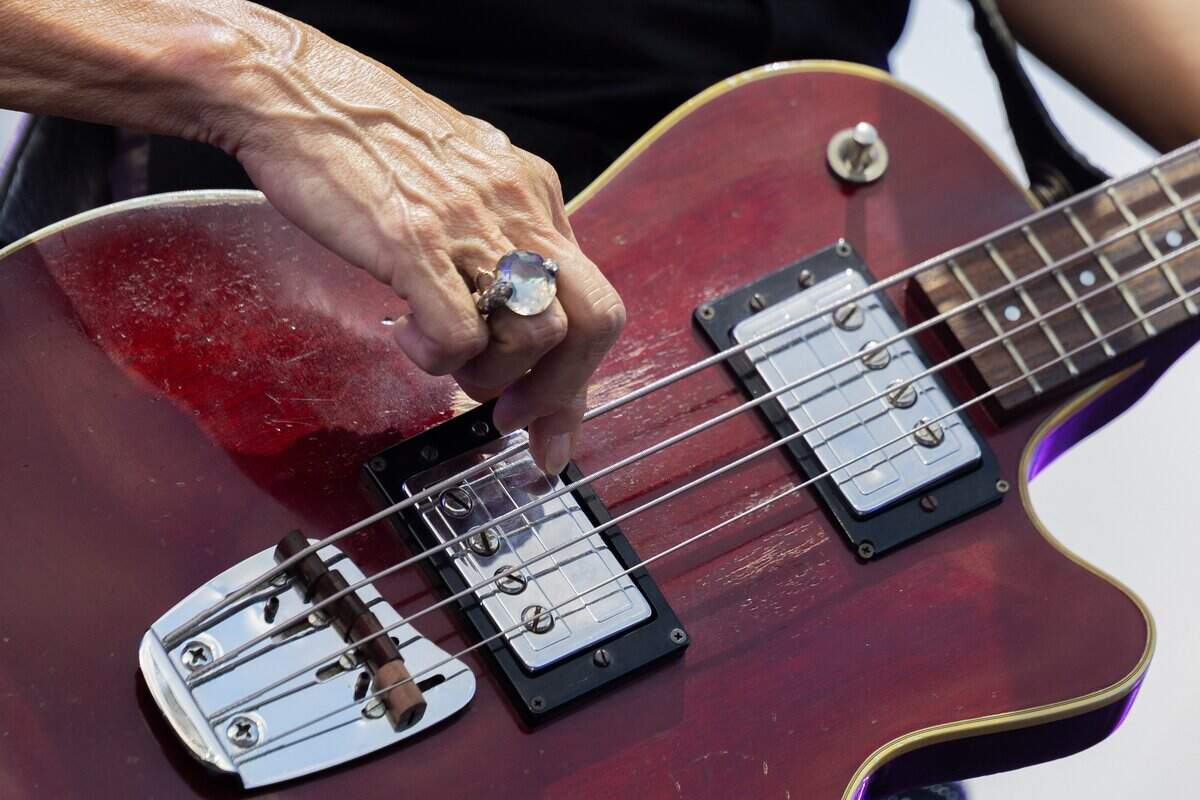 Sheryl Crow strikes a cord on their guitar during their FIFA Fan Fest concert at Fan Fest on Friday, July 10, 2026.