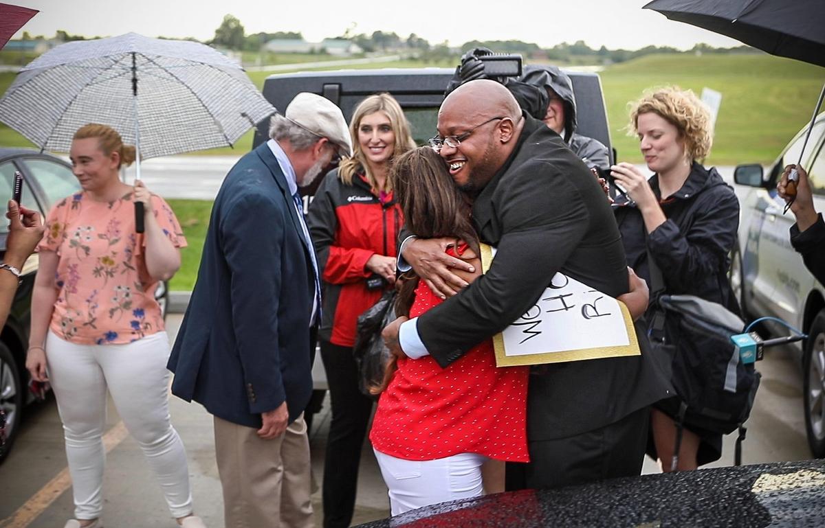 Ricky Kidd hugs his sister, Nechelle Kidd, after being freed from the Western Missouri Correctional Center on Aug. 15, 2019.