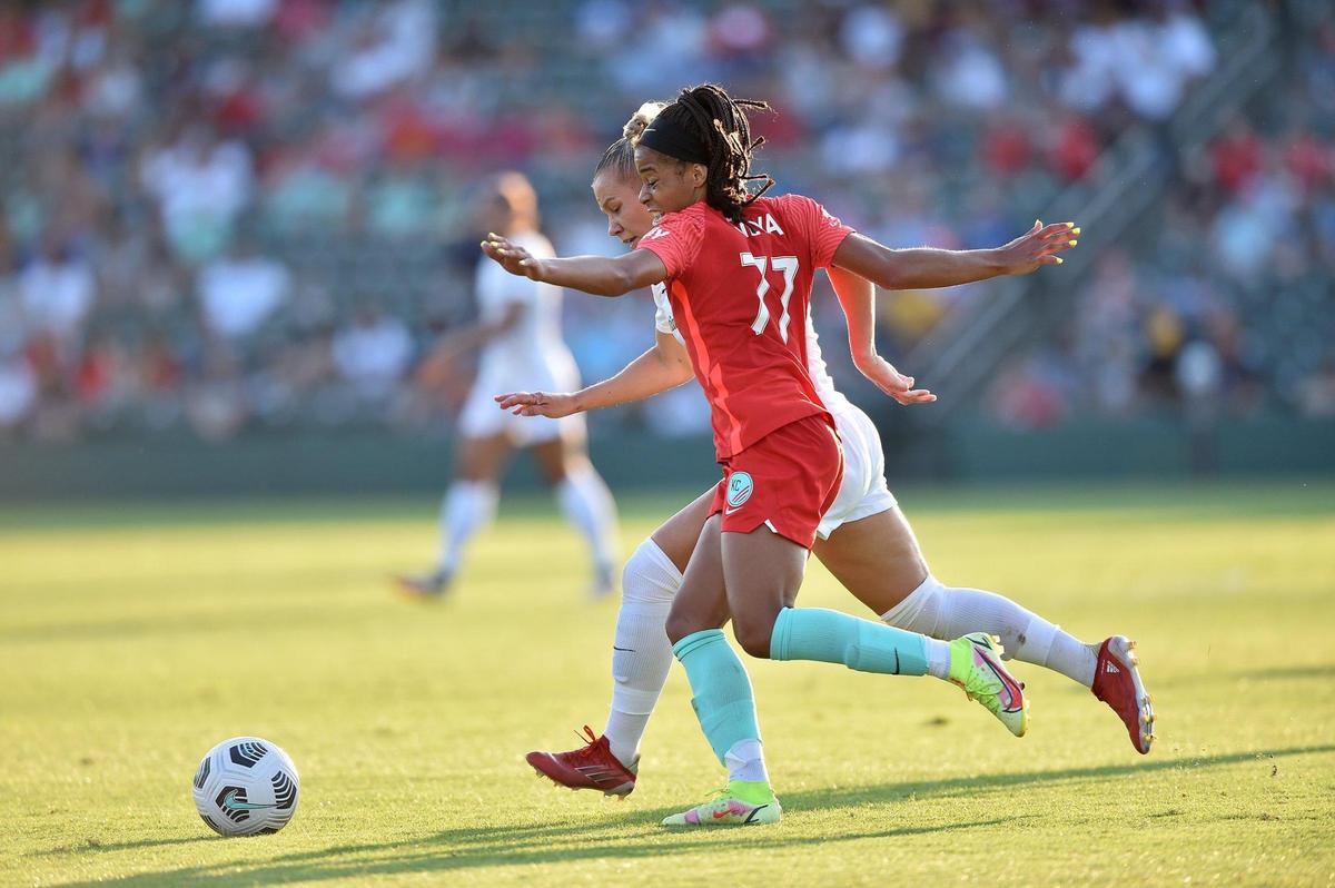 Kansas City forward Jéssica Silva, foreground, and North Carolina defender Merritt Mathias battle for the ball during a game this season in Kansas City, Kan.