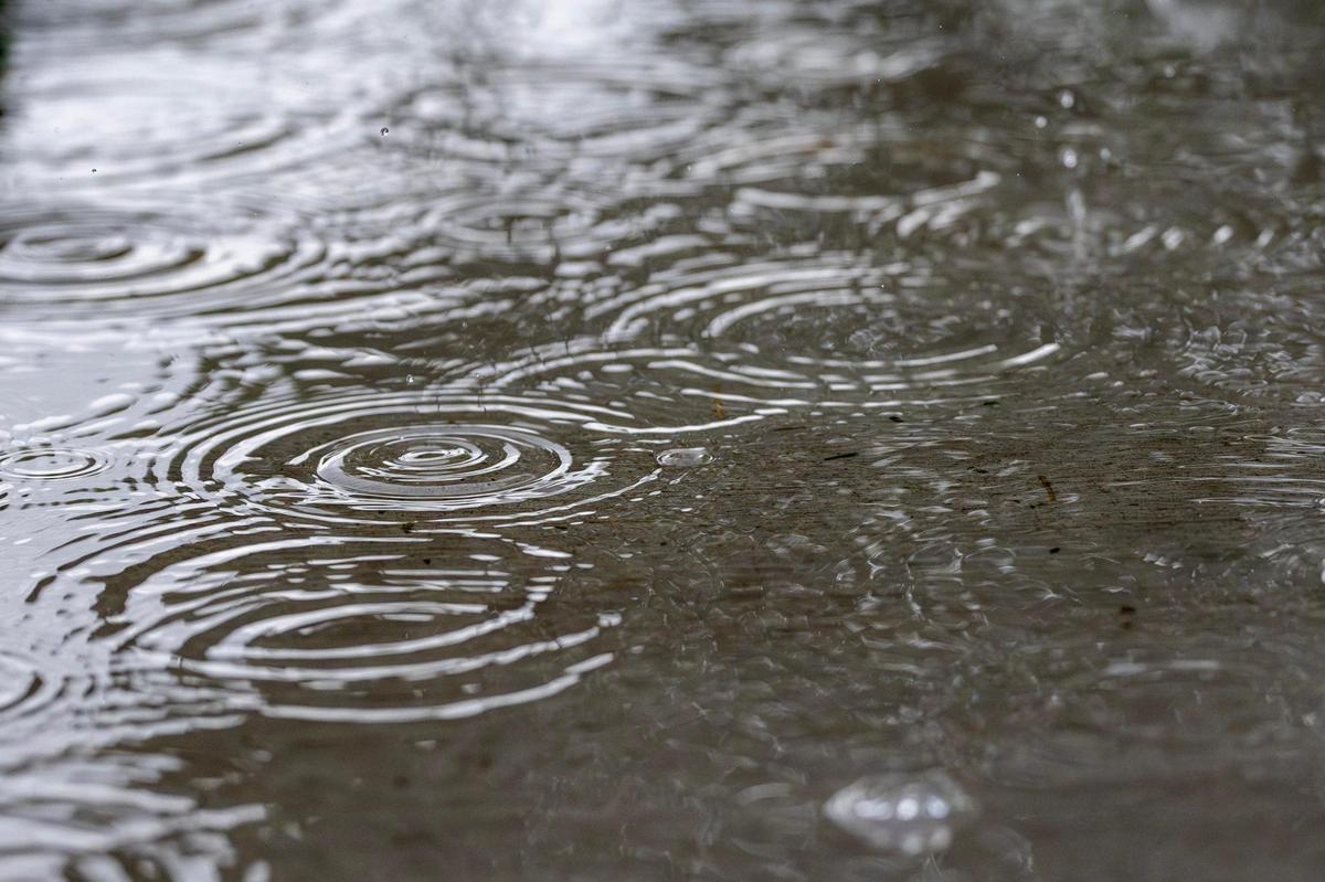 Raindrops ripple across puddles on Tuesday, June 3, 2025, in Kansas City.