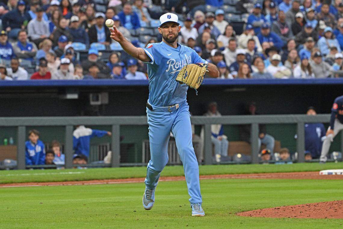 Kansas City Royals starting pitcher Michael Wacha (52) throws to first base for an out in the forth inning against the Houston Astros at Kauffman Stadium on Apr 26, 2025 in Kansas City, Missouri, USA.