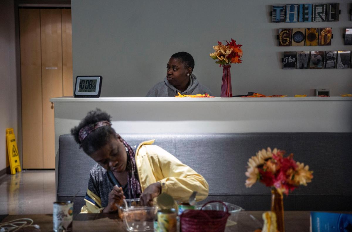 Shavannaha Bryers (rear), visited Outreach, a nonprofit that helps homeless youth in Indianapolis.