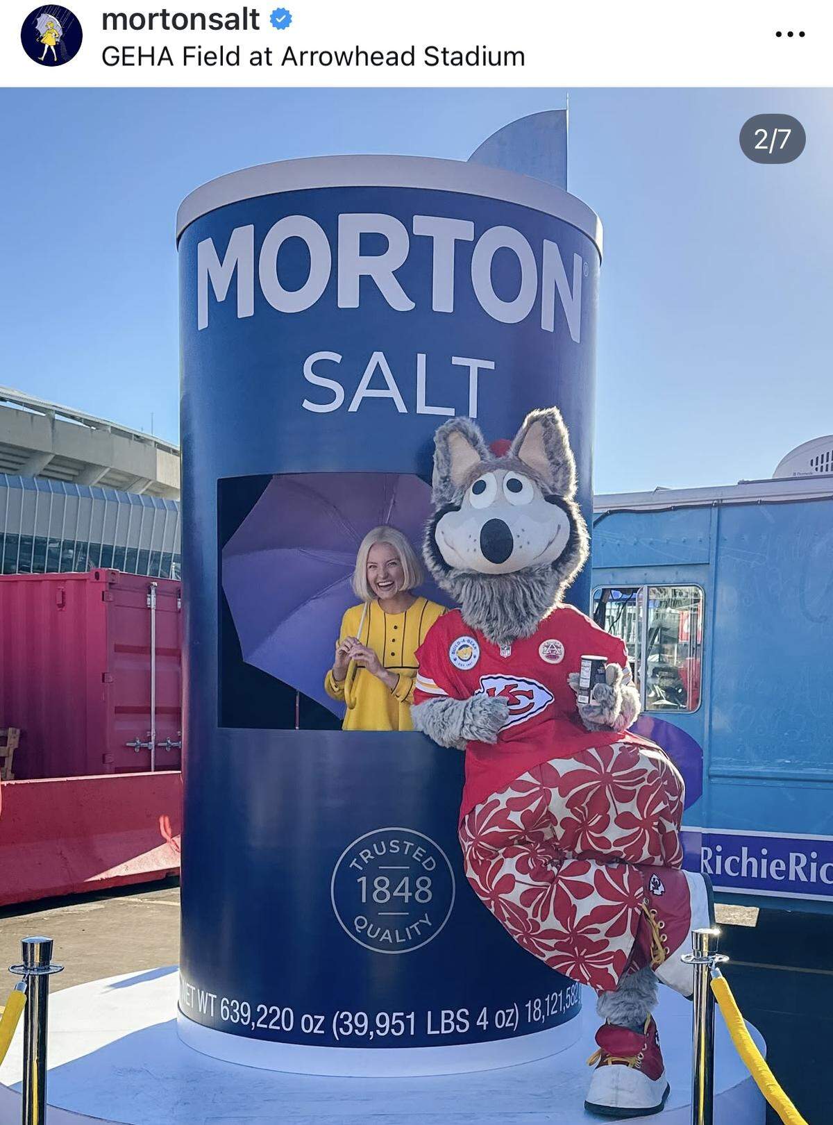 The Morton Salt Girl with K.C. Wolf at a Chiefs tailgate in October.