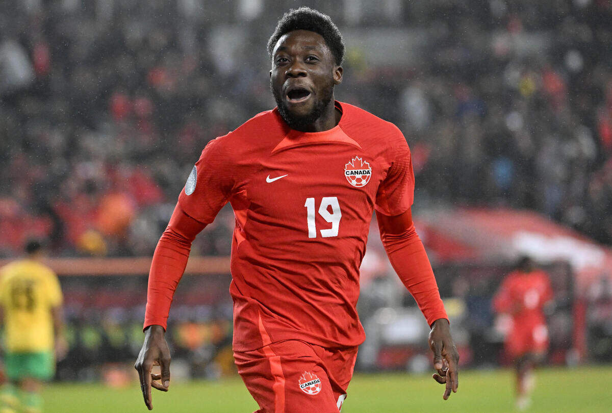 Canada midfielder Alphonso Davies (19) celebrates after scoring a goal against Jamaica in the first half at BMO Field on Nov. 21, 2023.