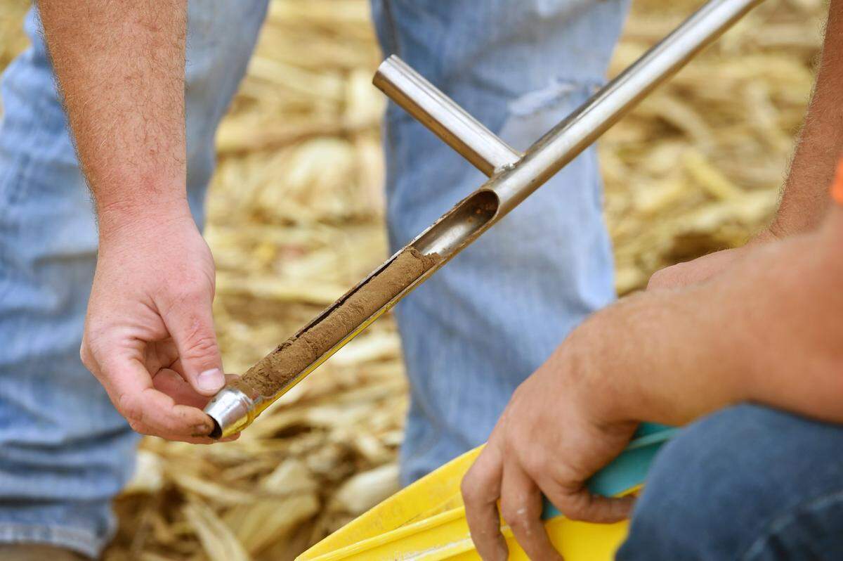 A soil sample is taken on the Iowa Tribe of Kansas and Nebraska reservation near White Cloud, Kansas. As part of its regenerative agriculture program, the tribe began using the Haney soil test in 2015. Testing the soil will help improve the health of the soil, reduce chemical use and confirm nutrient balance in the soil.