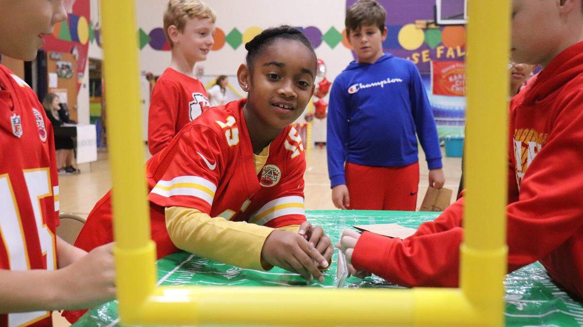 Chiefs mascot KC Wolf made an appearance at the Lee’s Summit school, where at least two Patrick Mahomes look-alikes participated in the fun.