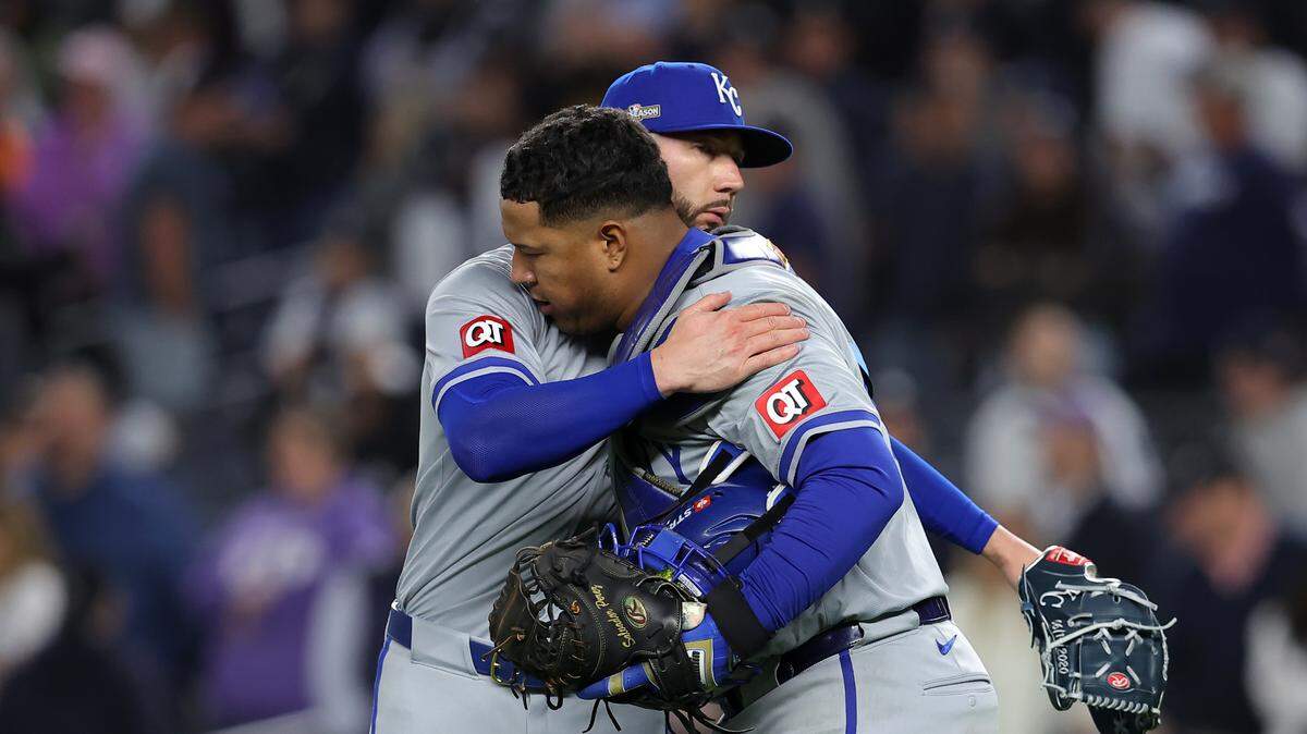 Kansas City Royals pitcher Lucas Erceg (60) reacts with catcher Salvador Perez (13) after the final out of Game 2 of the ALDS against the New York Yankees on Oct. 7, 2024, in Bronx, New York.