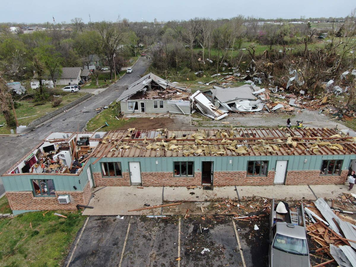 The Oaks student housing center, foreground, and other nearby structures in Nevada, Missouri, sustained heavy damage when they were hit by a tornado that tore through the town on April 2, 2025.