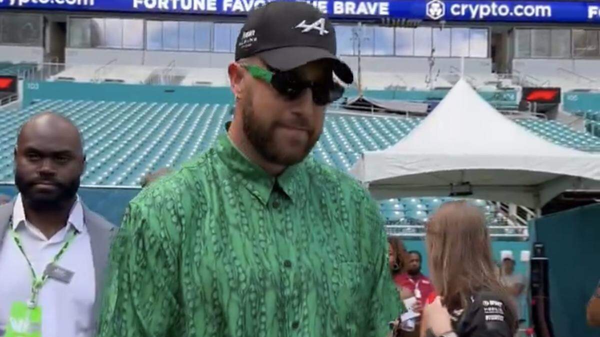 Travis Kelce went Hawaiian at the Miami Grand Prix on Sunday, wearing a matching Givenchy shirt and short set. He traveled solo to South Florida, with girlfriend Taylor Swift reportedly in Paris gearing up to resume the Eras Tour on Thursday.