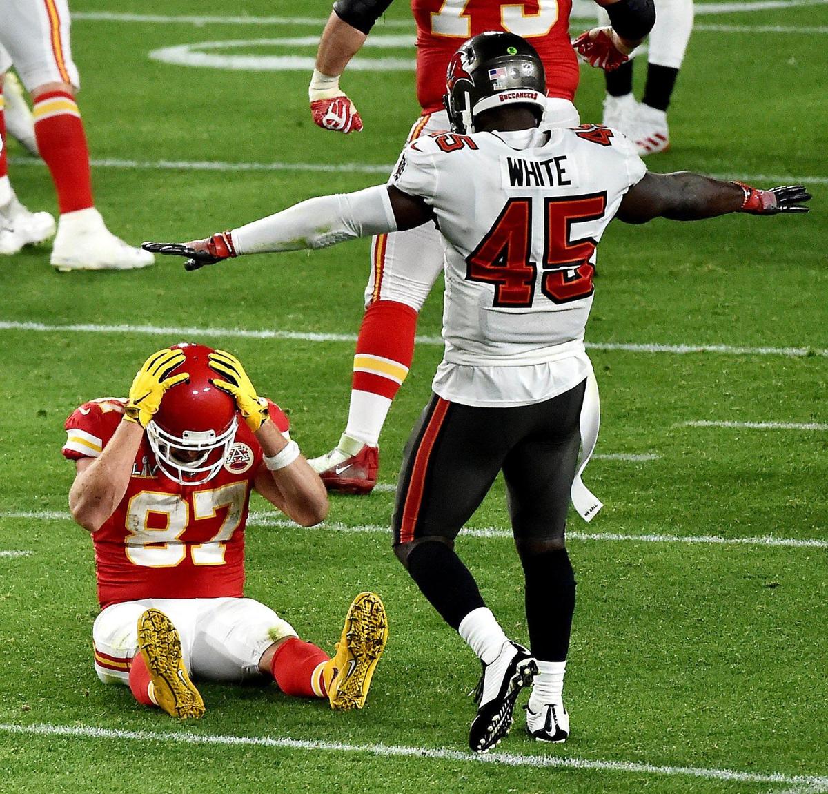 Tampa Bay Buccaneers inside linebacker Devin White signals incomplete pass over Kansas City Chiefs tight end Travis Kelce after Kelce couldn’t hold onto the ball for a third down conversion in the third quarter Sunday, February 7, 2021, at Super Bowl LV at Raymond James Stadium in Tampa, Florida.