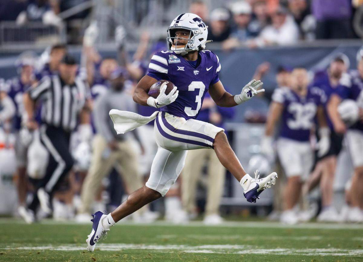 Kansas State Wildcats running back Dylan Edwards (3) runs for a touchdown against the Rutgers Scarlet Knights during the second half of the Rate Bowl at Chase Field on Dec. 26, 2024.
