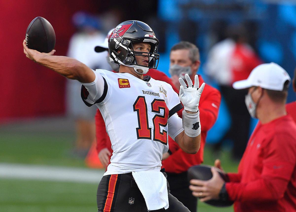Tampa Bay Buccaneers quarterback Tom Brady warmed up on the field Sunday, February 7, 2021, before Super Bowl LV at Raymond James Stadium in Tampa, Florida.