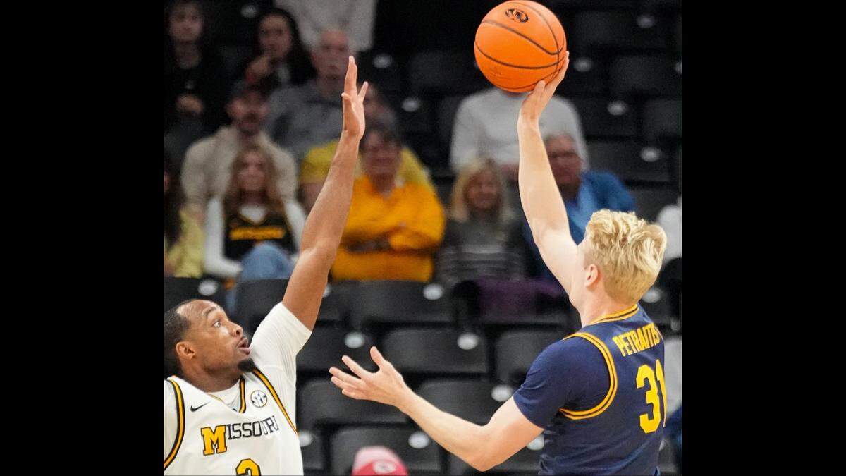 California Golden Bears forward Rytis Petraitis shoots over Missouri Tigers guard Tamar Bates during a Tuesday, Dec 3, 2024 men’s college basketball game Mizzou Arena in Columbia.