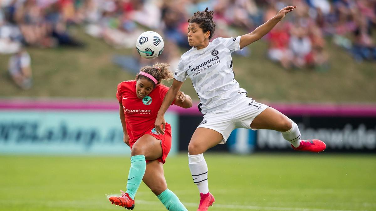 Kansas City midfielder Desiree Scott, left, and Portland Thorns midfielder Raquel Rodríguez fought for the ball during a match last season at Legends Field in Kansas City, Kansas.