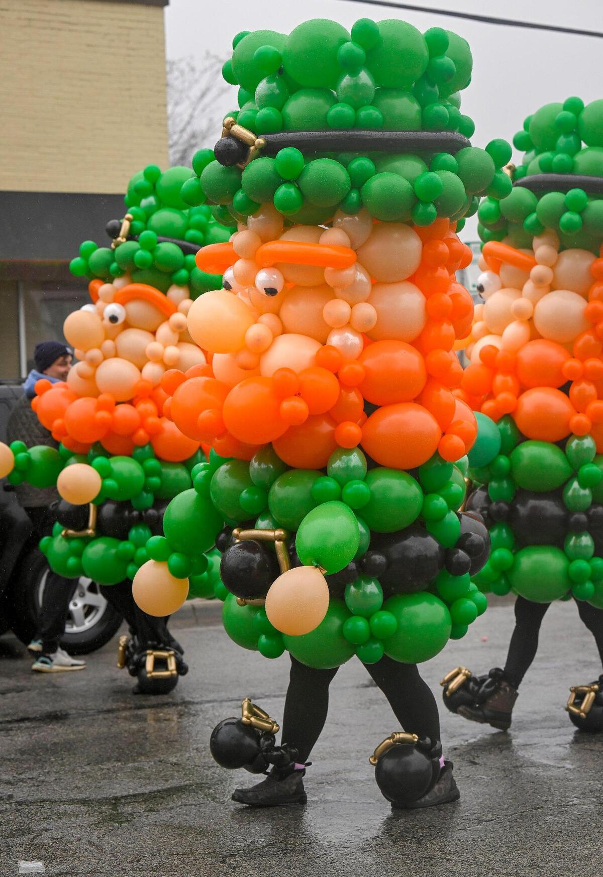Balloon leprechauns from Up, Up & Away! Kansas City Balloons, walked in the 2023 Brookside St. Patrick’s Day Warm-Up Parade on Saturday March 11, 2023 in Kansas City.