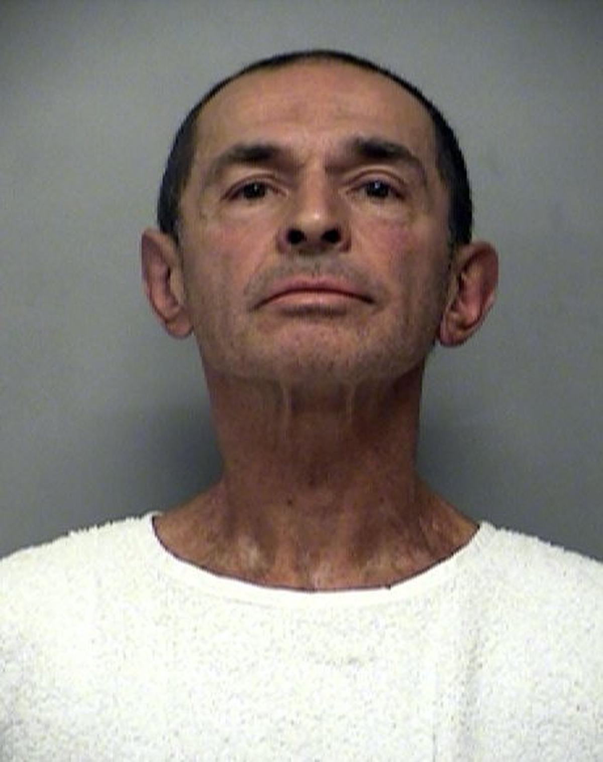 A booking photo from 2017 shows Robert Gross, 66, after his arrest in Liberty on a federal gun charge. Gross now faces numerous charges of interstate stalking and firearms offenses. He remains in federal custody pending trial.