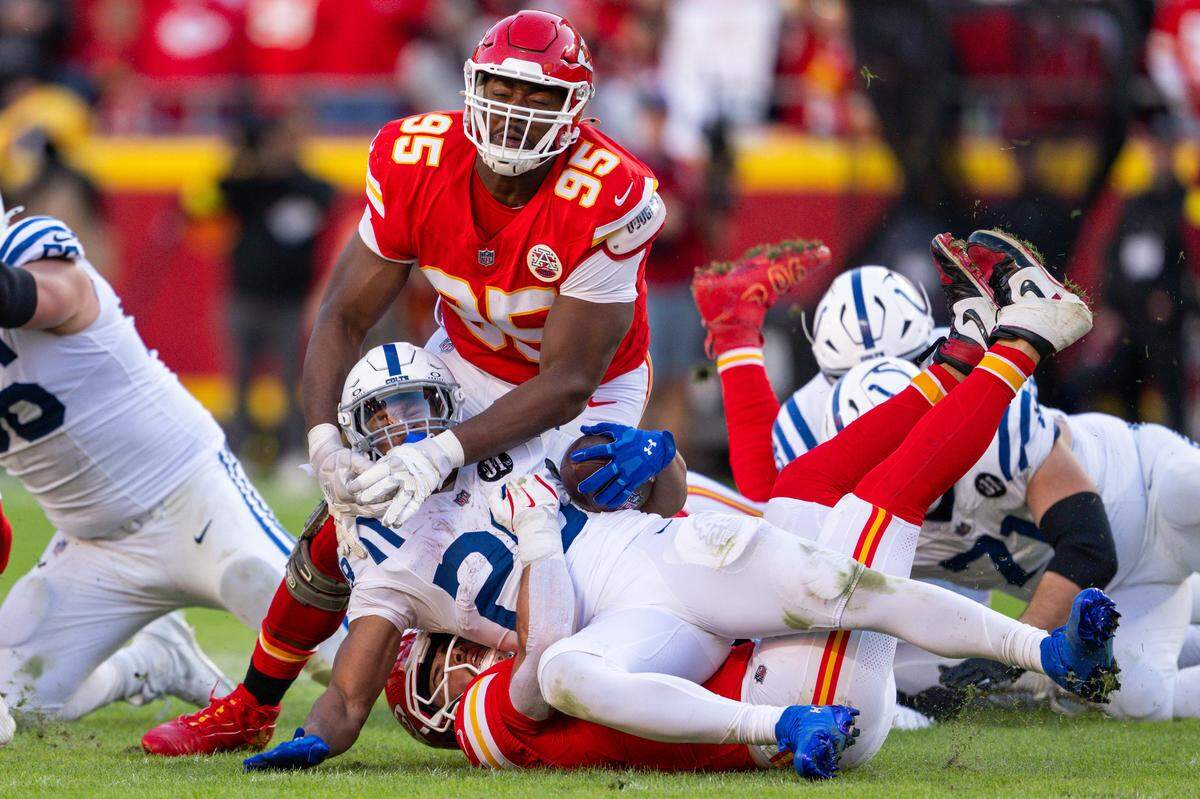 Chiefs defensive lineman Chris Jones (No. 95) tackles Indianapolis Colts running back Jonathan Taylor (No. 28) during an NFL Week 12 game at GEHA Field at Arrowhead Stadium in Kansas City on Sunday, Nov. 23, 2025.