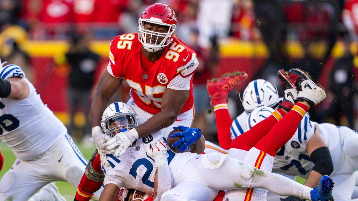 Kansas City Chiefs defensive end Chris Jones (95) makes a tackle on Indianapolis Colts running back Jonathan Taylor (28) late in the second half of the Chiefs game against the Indianapolis Colts on Sunday, November 23, 2025, at GEHA Field at Arrowhead Stadium.